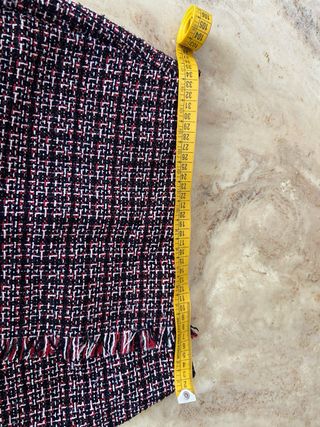 Falda cuadros flecos