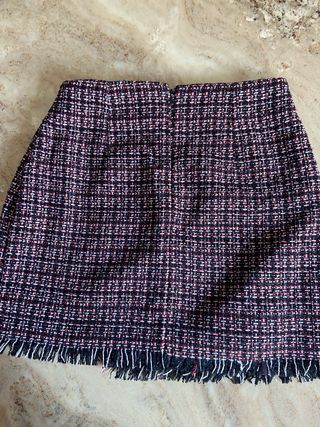 Falda cuadros flecos