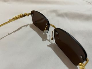 Gafas de sol de lujo doradas