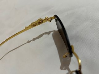 Gafas de sol de lujo doradas