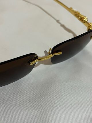 Gafas de sol de lujo doradas