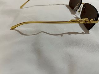 Gafas de sol de lujo doradas