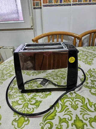 Tostadora de pan acero doble ,venta en persona