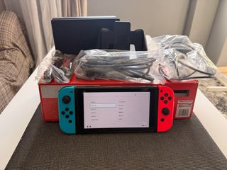 Nintendo Switch Azul y Rojo Completa poco uso