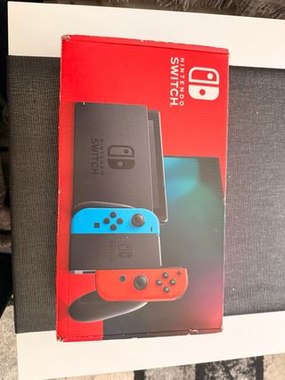 Nintendo Switch Azul y Rojo Completa poco uso