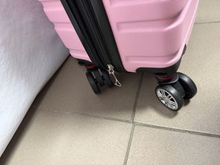Maleta rosa con 4 ruedas desmontables