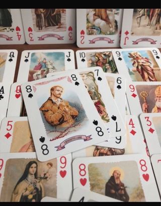 Carte da gioco vintage con immagini sacre