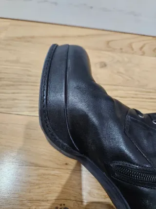 Botas de plataforma altas negras. Hecho en España