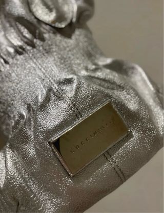 Borsa Coccinelle fiocco argento