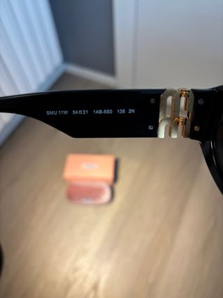 Occhiali da sole Miu Miu Glimpse SMU 11W