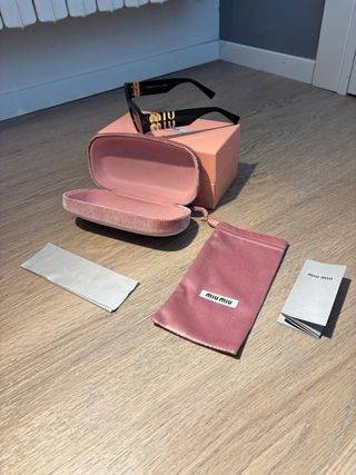 Occhiali da sole Miu Miu Glimpse SMU 11W