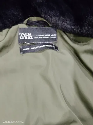 Cazadora verde con capucha y pelo