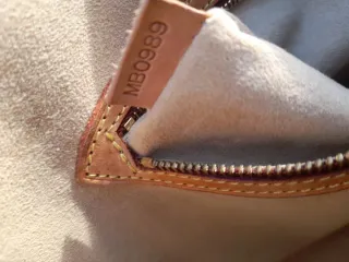 Borsa Louis Vuitton Babylon Marrone