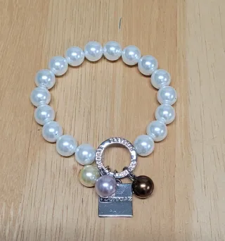 Pulsera Pertegaz. Perlas y Dijes