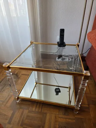 Mesa de centro cristal y metal dorado