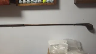 Palo de golf de madera vintage