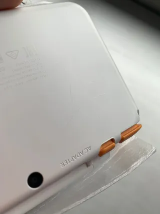 New Nintendo 2DS XL Blanca y Naranja