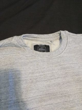 Sudadera gris con cremallera lateral