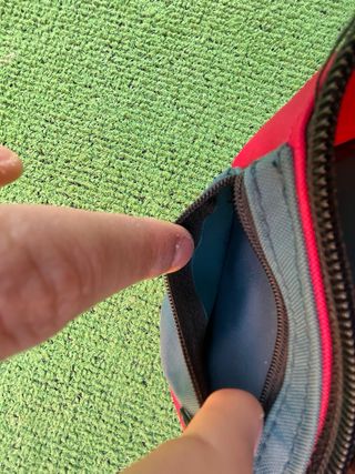 Riñonera Reebok roja y verde