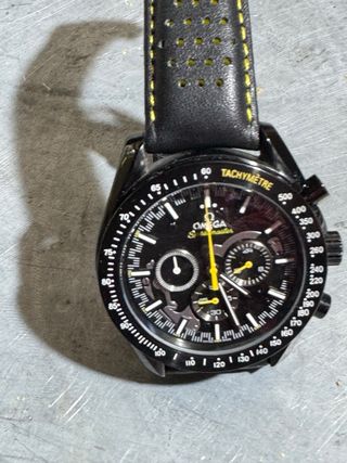 Reloj Omega Speedmaster Negro y Dorado