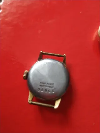 Reloj de cuerda songines