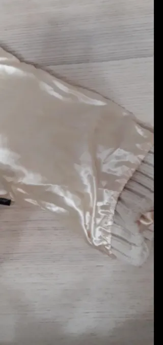 Berretto lana beige con pompon