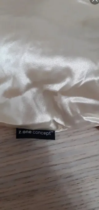 Berretto lana beige con pompon