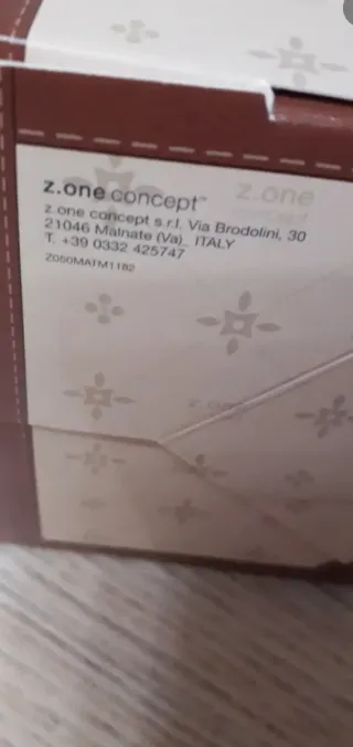 Berretto lana beige con pompon