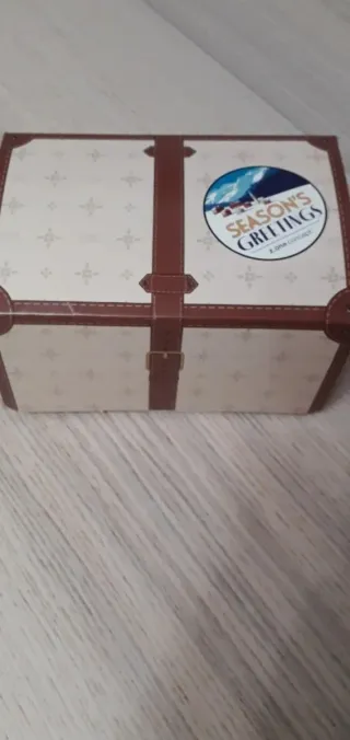 Berretto lana beige con pompon