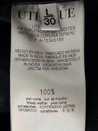 Abrigo Uterqüe Piel Negro