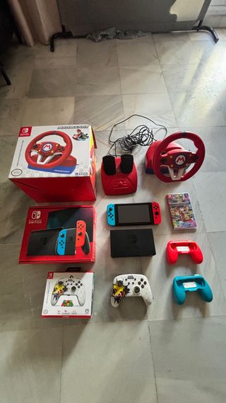 Nintendo Switch + Mario Kart + Volante + Mando Pro