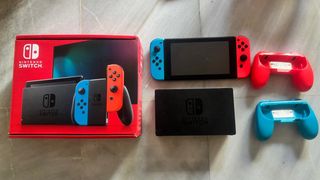 Nintendo Switch + Mario Kart + Volante + Mando Pro