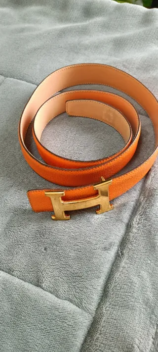 Cinturón Hermès naranja y dorado