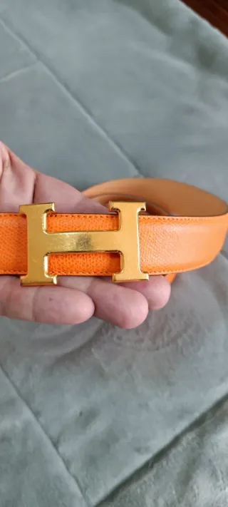 Cinturón Hermès naranja y dorado
