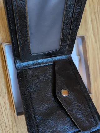 Cartera de piel negra sin estrenar