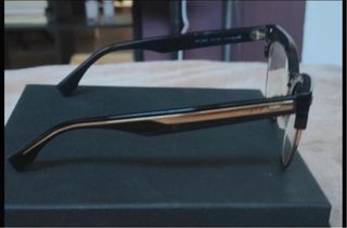 Occhiali da sole Fendi neri e oro. Modello FF0163.