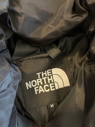Abrigo The North Face azul y negro