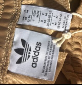 Pantalone tuta Adidas marrone con strisce verdi