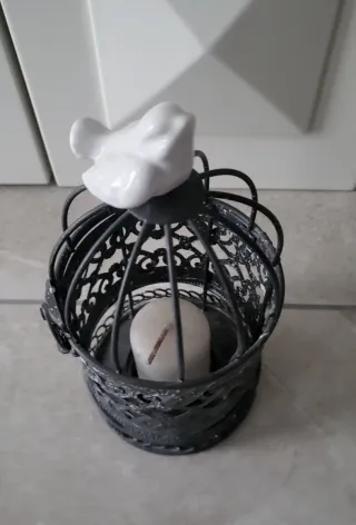 Portacandele decorativo con uccellino