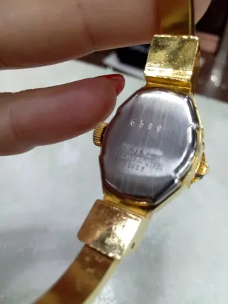 Orologio vintage con quadrante floreale