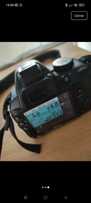 Cámara Nikon D3100 con accesorios