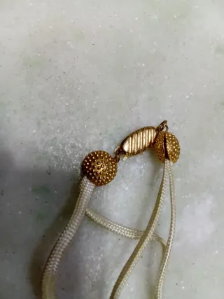 Collana con perle e ciondoli