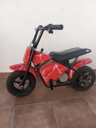 Moto eléctrica infantil roja de espiderman