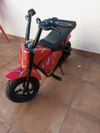 Moto eléctrica infantil roja de espiderman