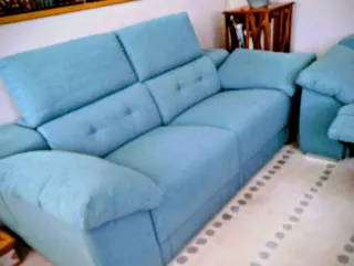 Dos sofás de tela azul 205x100 cm.