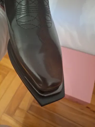 Botas cowboy negras con cadena