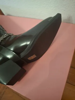 Botas cowboy negras con cadena