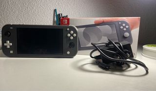 Nintendo Switch Lite Gris + Juego Animal Crossing