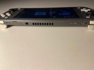 Nintendo Switch Lite Gris + Juego Animal Crossing