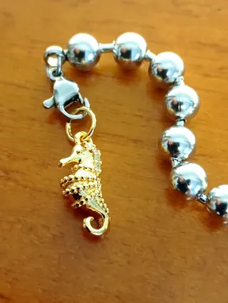 Dije Seahorse Chapado en Oro 14k